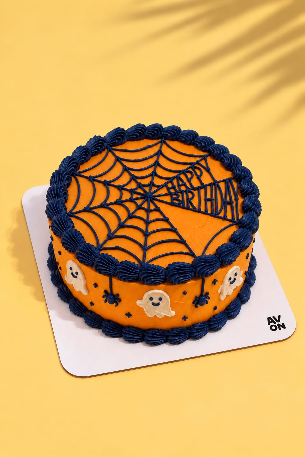 Spooky Web cake with a spider-web design by Avon Cake